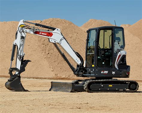 running a mini excavator|operating a bobcat mini excavator.